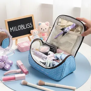 Borsa cosmetica azzurra a pois con grande capacità per trucco o articoli di cancelleria.