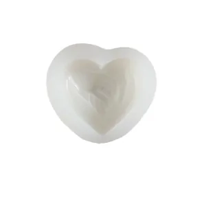 Heart-shaped silicone mold featuring hand-holding design for DIY scented candles