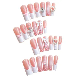 Handgemaakte French press-on nagels met roze glitters, 3D-strikjes en parelharten