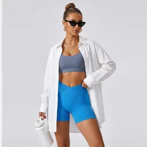 High-waist blue seamless yoga shorts with crossover waistband for fitness training