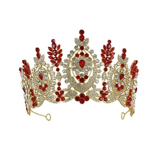 Luxury Baroque bridal crown decorated with red and white rhinestones on white background