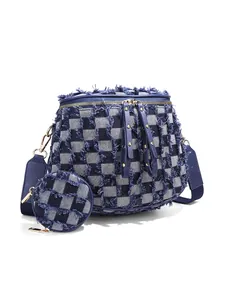 Distressed blue checkerboard denim crossbody bag with fringe detail and small purse