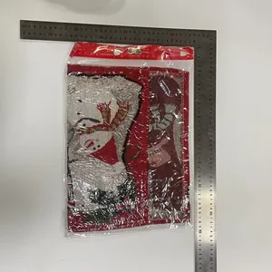 Christmas snowman knitted jacquard placemat measured with ruler for size reference