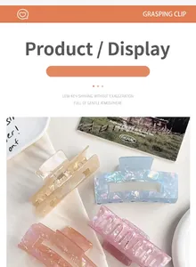 Detail view of shimmering mermaid-style hair claw clips in various pastel colors