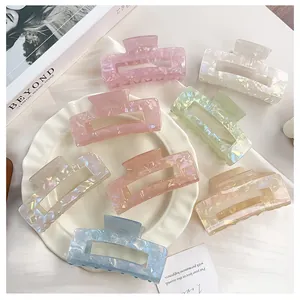 Large iridescent mermaid claw clips in various colors with a shiny acetic acid finish