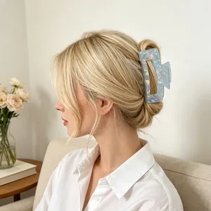 Large iridescent mermaid hair claw clip for elegant bun hairstyles