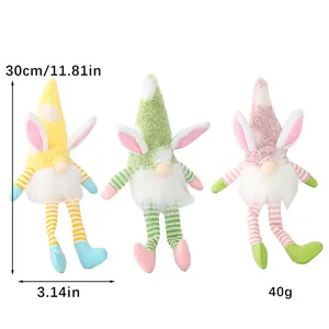 Detail of three colorful Easter plush gnomes with bunny ears and dimensions marked