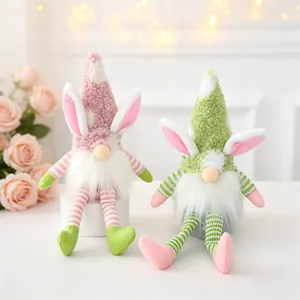 Pair of plush Easter gnomes with bunny ears and long striped legs, soft texture detail