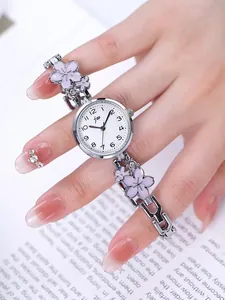 Elegant silver women's quartz watch featuring pink floral bracelet with sparkling accents