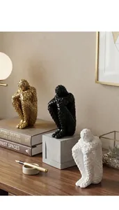 Close-up detail of abstract human sculptures with modern mosaic texture for home decor