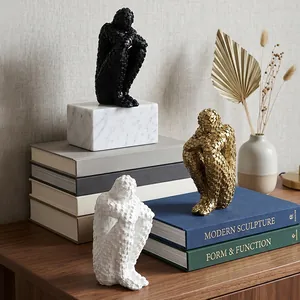 Modern abstract mosaic style human sculptures in gold white and black for luxury home decor