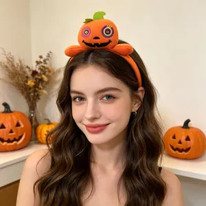 Detailed view of a cute plush pumpkin headband worn by a smiling woman for Halloween