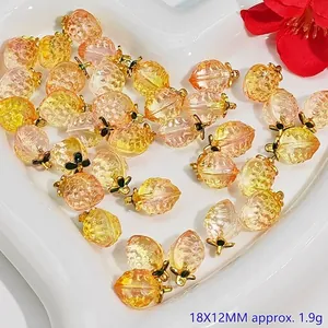 Close-up detail of 18x12mm crystal peach pendants for DIY handmade jewelry making