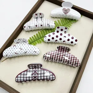 Collection of Korean style hair claw clips with polka dots, plaid, and heart patterns