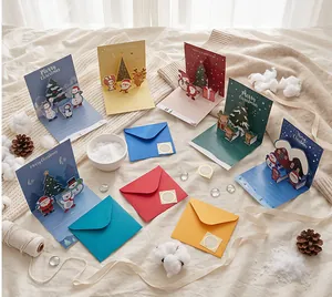 Set of creative 3D Christmas pop-up greeting cards with colorful envelopes and festive designs