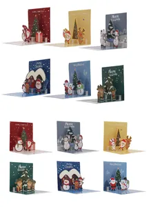 Detailed view of various 3D Christmas pop-up cards with Santa and reindeer themes