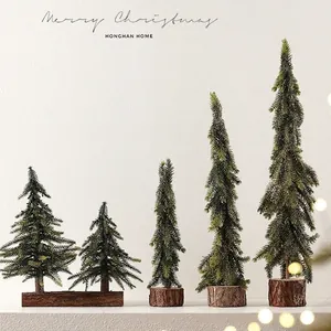 Set of mini artificial Christmas tree ornaments with wooden bases for tabletop decor
