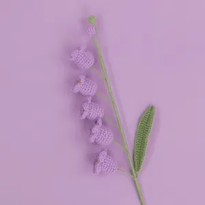 Hand-crocheted purple lily of the valley artificial flower with green leaf detail