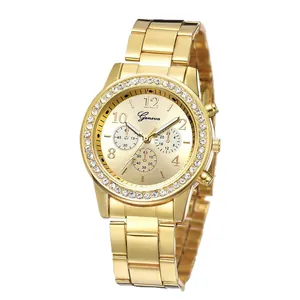 Montre femme dorée élégante avec lunette en strass et bracelet métallique