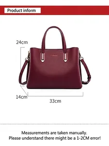 Detailed view of stylish burgundy tote bag with manual measurements 33x14x24cm marked