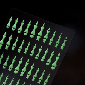 3D ανάγλυφα φωσφορίζοντα αυτοκόλλητα νυχιών με κόκαλα σκελετού για Halloween διακόσμηση