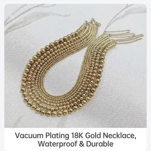 Detailed view of multi-layered waterproof 18K gold-plated stainless steel bead necklaces.