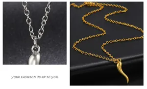 Detailed macro view of gold and silver chili pepper pendants for DIY jewelry making.
