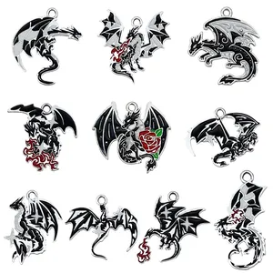 Breloques en émail de dragon style gothique noir et blanc pour la création de bijoux.