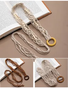 Detailed close-up showing various colors of handmade Bohemian woven macrame belts.