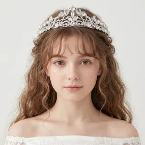 Detailed close-up of a sparkling silver rhinestone bridal tiara worn by a beautiful model