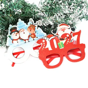Close-up of festive Christmas glasses featuring Santa, snowman, and elk designs.