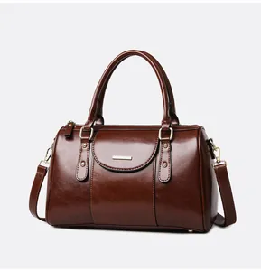 Vintage glossy brown oil-wax leather Boston handbag with top handles and strap