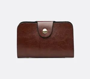 Classic retro brown oil leather small wallet with a stylish gold snap closure for women