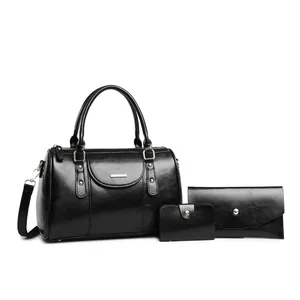 Elegant retro black Boston 3-piece handbag set with adjustable shoulder strap and clutch