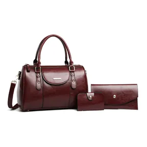 Vintage burgundy oil-wax leather 3-piece handbag, wallet, and card holder set.