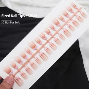 Elegant short ballerina press-on nails with a pink blush gradient French tip design.