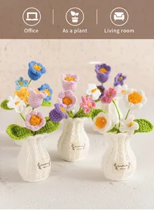 Close-up of handmade crochet flower potted ornaments for office and living room decor
