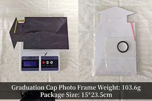 Close-up detail of graduation cap photo frame showing packaging size and product weight