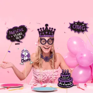 Purple glitter birthday photo booth props set used by a model at a pink themed party