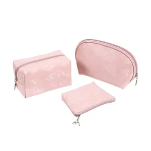 Set of 3 pink PU waterproof makeup bags with elegant floral embossed patterns