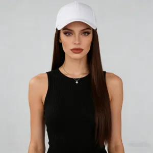 Front view of a white baseball cap with attached long straight brown hair on a model.