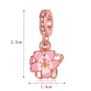 Rose gold cherry blossom charm detail with 2.5cm height and 1.4cm width dimensions.