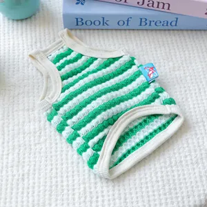 Close-up of green striped breathable knit pet vest for small dogs