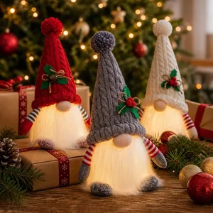 Handmade set of 3 glowing Christmas gnomes with knitted hats for festive holiday table decor