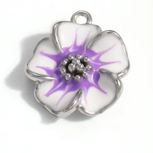 Close-up of a white and purple enamel flower charm pendant made of high quality stainless steel