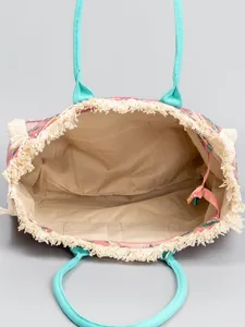 Grand sac cabas bohème en toile avec anses bleu sarcelle et poche zippée intérieure.