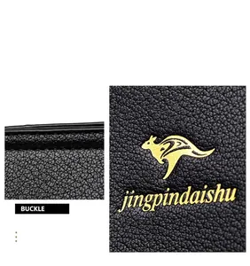 Detail view of black pebbled leather tote bag with golden kangaroo logo and texture