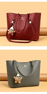 Two large capacity leather tote bags in burgundy and grey colors for daily commute