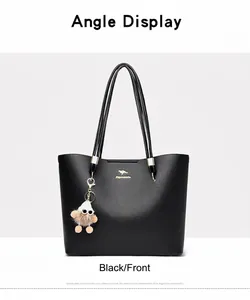 Front view of a black textured leather large capacity commuter tote bag