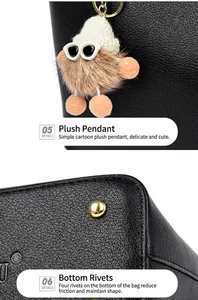 Detail view showing the cute plush pendant and protective bottom studs of the tote bag.